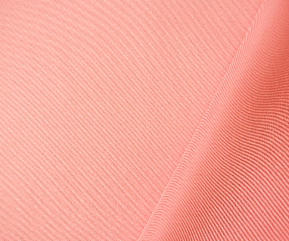 Apricot Pink Poly Spandex Stretch Solid Stretch Lamour Woven Fabric - Image 2