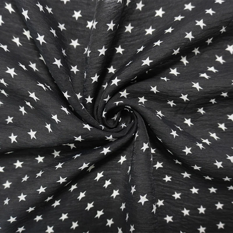 Black-White Nylon-Rayon Star Printed Crinkled Chiffon Yoryu Woven Fabric