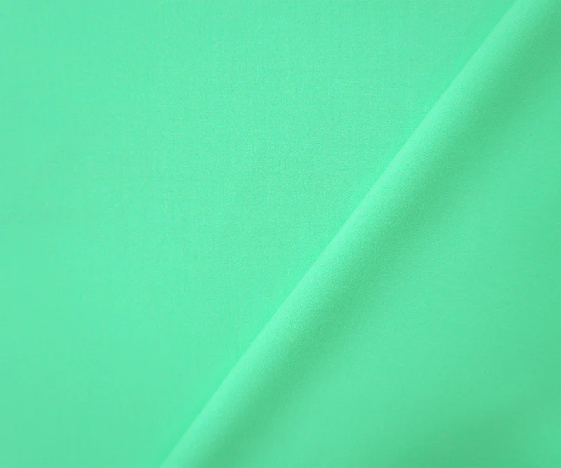 Green Poly Rayon Spandex Stretch Solid Woven Suiting Fabric - Image 2